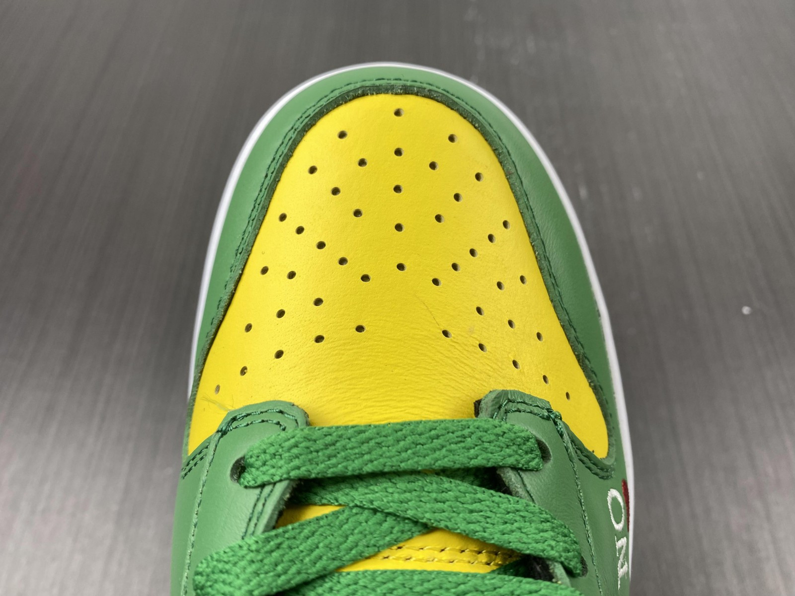 Supreme x Nike SB Dunk High “By Any Means” DN3741-700