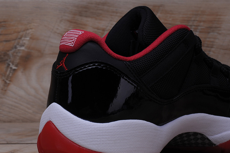 AIR JORDAN 11 RETRO LOW "BRED" BLACK/ RED mens 528895-012